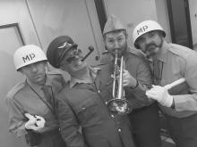 MPs, General MacArthur & Bugler